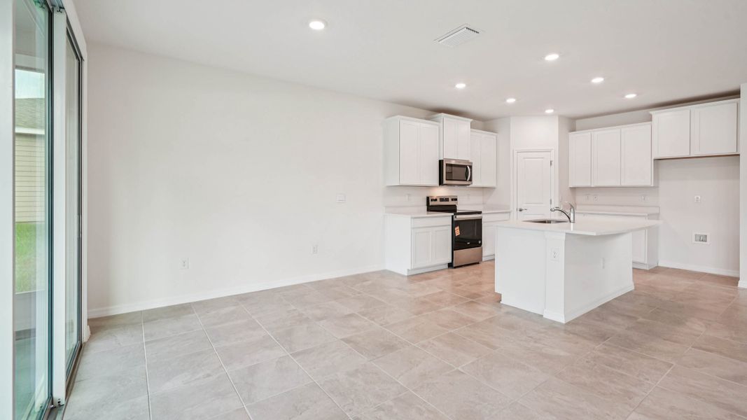 Representative unfurnished interior of a home built from the Coral by D.R. Horton in Oaks Preserve, Gainesville (Image 20).