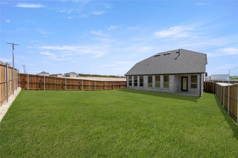 Front exterior of a new home in Country Hollow Sales Phase 1, Aledo, TX, highlighting curb appeal (Image 1).