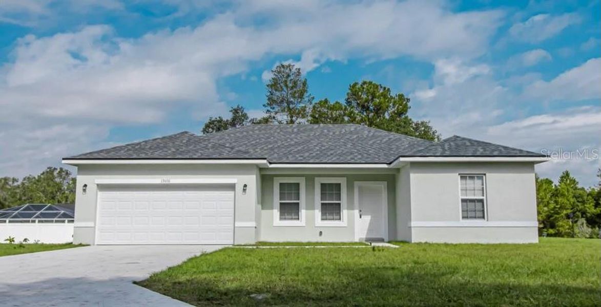 Front exterior of a new home in , Citrus Springs, FL, highlighting curb appeal (Image 6).