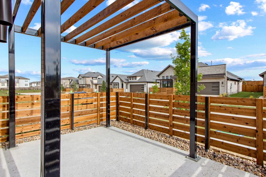 Exterior details and patio area of a home in Willow Grove Single-Family Homes, Melissa (Image 4). Exterior details and patio area of a home in Willow Grove Single-Family Homes, Melissa (Image 4).