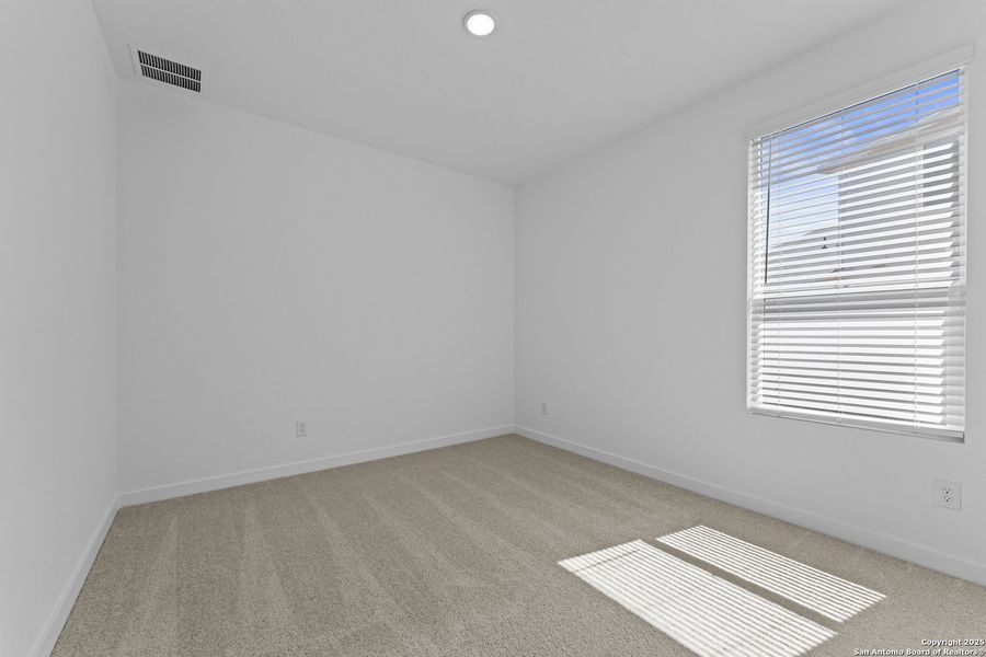 Spacious, unfurnished interior of a new home in Waterwheel: Coastline Collection, San Antonio (Image 16).