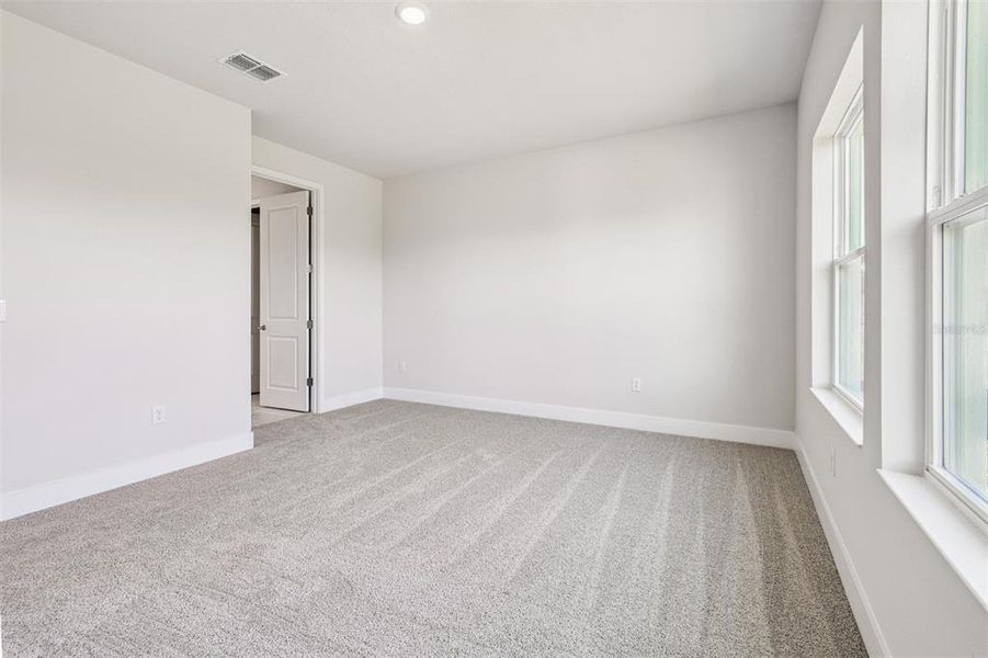 Spacious, unfurnished interior of a new home in Waterset Tradition Series, Apollo Beach (Image 25).