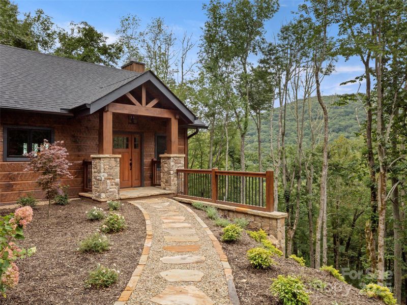 Front exterior of a new home in , Maggie Valley, NC, highlighting curb appeal (Image 23).