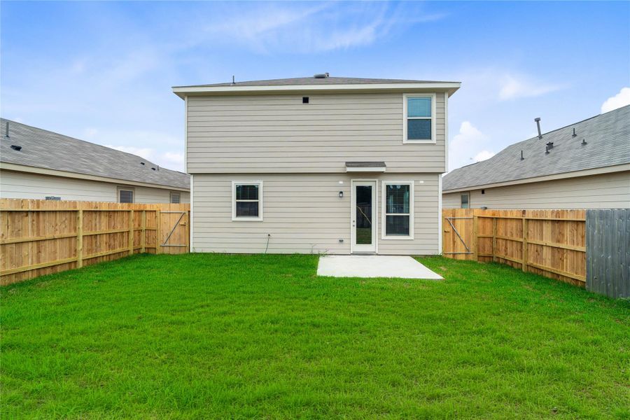 Come explore this expansive backyard featuring a beautiful patio slab—perfect for outdoor living! There's ample space for kids to play and adults to unwind. Ideal for patio furniture, a BBQ pit, and so much more—the possibilities are endless! Come explore this expansive backyard featuring a beautiful patio slab—perfect for outdoor living! There's ample space for kids to play and adults to unwind. Ideal for patio furniture, a BBQ pit, and so much more—the possibilities are endless!