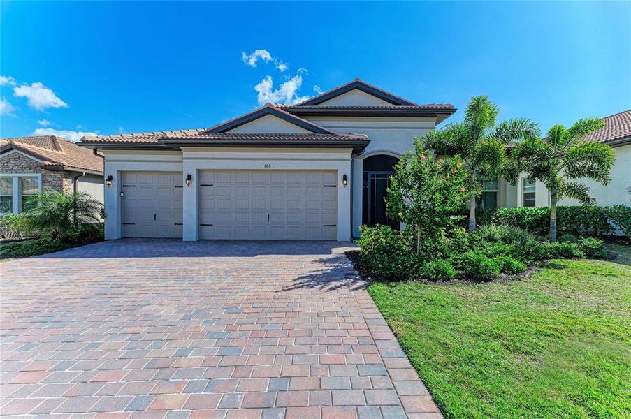 Front exterior of a new home in , Nokomis, FL, highlighting curb appeal (Image 28). Front exterior of a new home in , Nokomis, FL, highlighting curb appeal (Image 28).