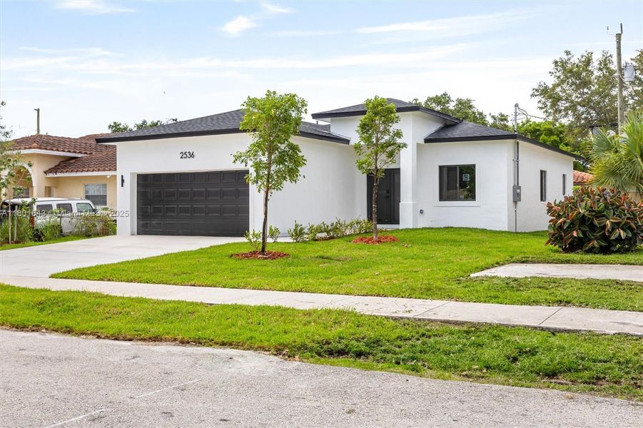 Front exterior of a new home in , Fort Lauderdale, FL, highlighting curb appeal (Image 1). Front exterior of a new home in , Fort Lauderdale, FL, highlighting curb appeal (Image 1).
