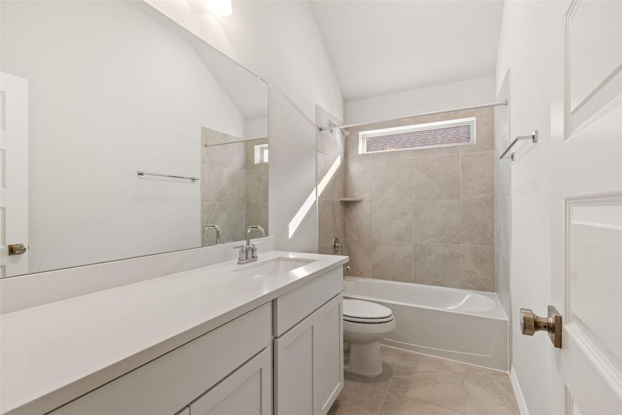 Furnished interior view inside a new home in Sunterra, Katy (Image 9).