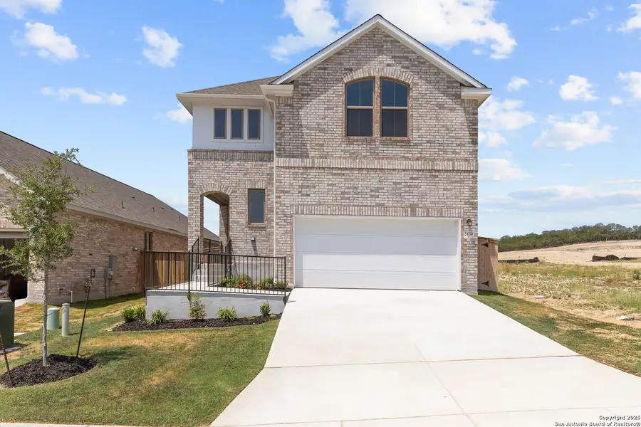 Front exterior of a new home in Ladera, San Antonio, TX, highlighting curb appeal (Image 18). Front exterior of a new home in Ladera, San Antonio, TX, highlighting curb appeal (Image 18).