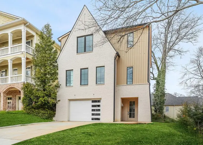Front exterior of a new home in , Atlanta, GA, highlighting curb appeal (Image 21).