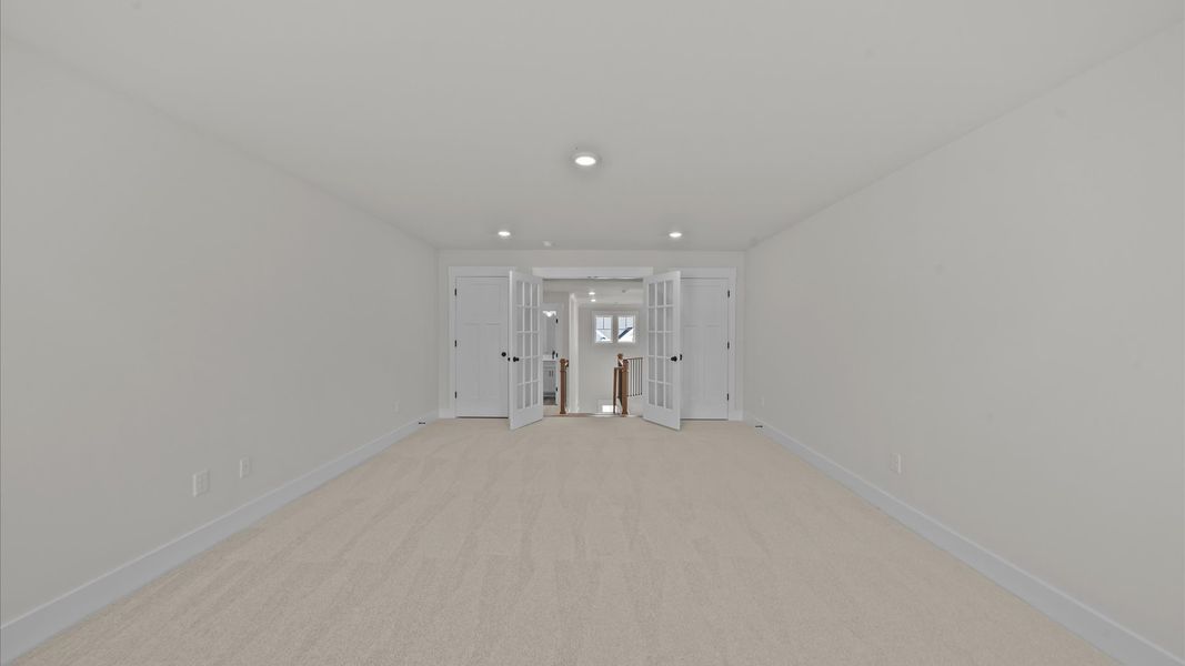 Superior bonus room with soft carpet, ideal for work, relaxation, or entertainment Superior bonus room with soft carpet, ideal for work, relaxation, or entertainment