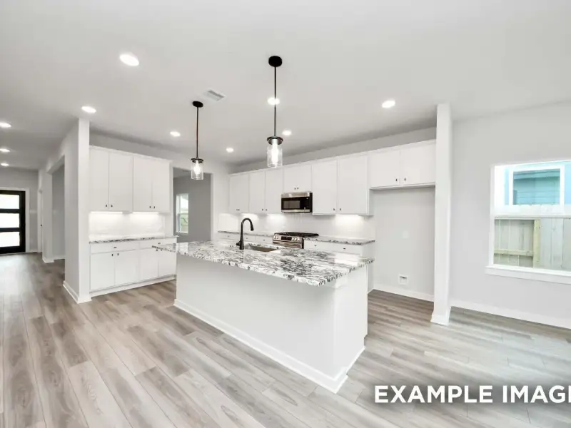Furnished interior view inside a new home in Sundance Cove, Crosby (Image 10).