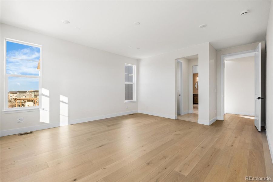 Spacious, unfurnished interior of a new home in Luxe at The Canyons, Castle Pines (Image 49).