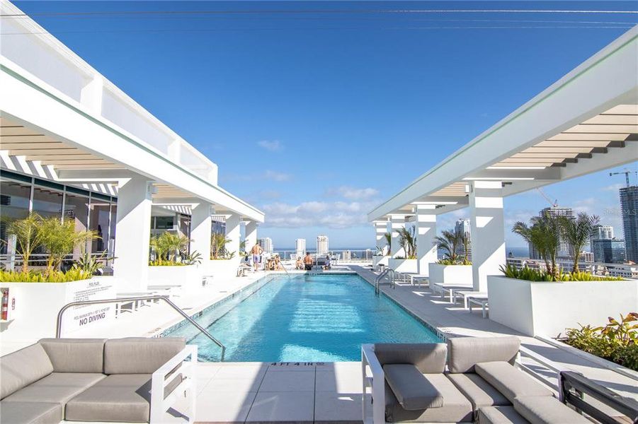 Saltwater heated pool with lap lane on south end