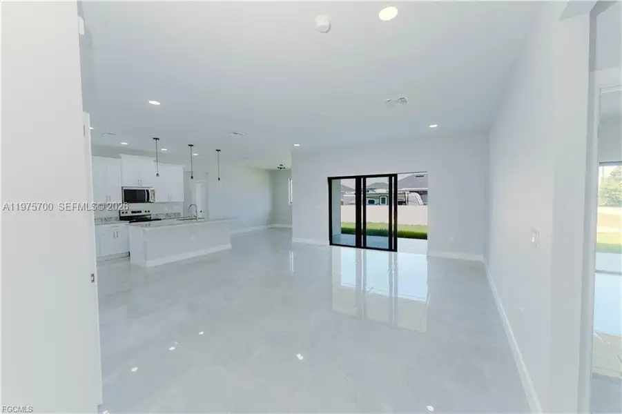 Spacious, unfurnished interior of a new home in , Lehigh Acres (Image 6).
