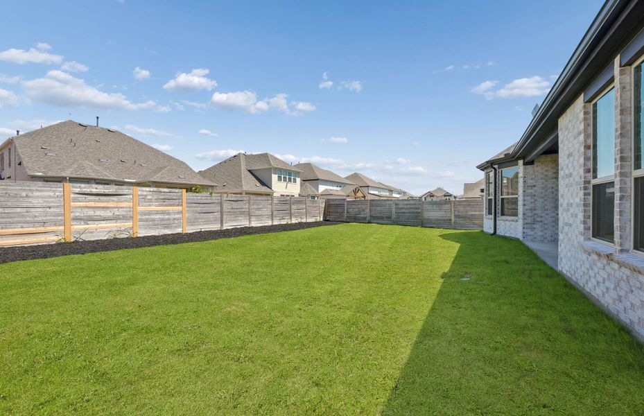 Exterior details and patio area of a home in Bluffview Reserve, Leander (Image 29).