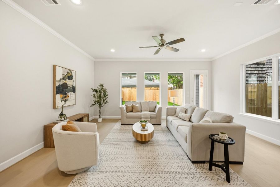 Bask in the warmth of the living room, where neutral light walls and exquisite light wood floors craft an ambiance of understated elegance. Bask in the warmth of the living room, where neutral light walls and exquisite light wood floors craft an ambiance of understated elegance.