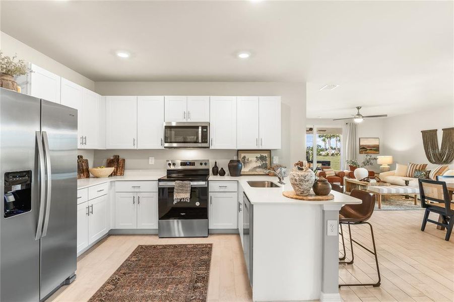 Furnished interior view inside a new home in Central Parc, North Port (Image 10). Furnished interior view inside a new home in Central Parc, North Port (Image 10).