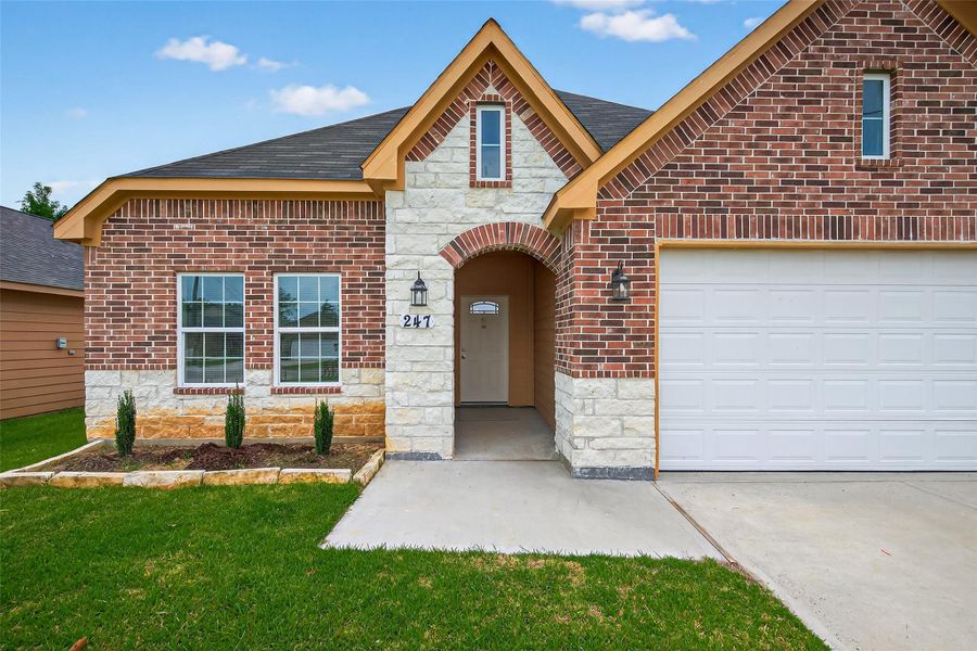 Front exterior of a new home in , Cleveland, TX, highlighting curb appeal (Image 23). Front exterior of a new home in , Cleveland, TX, highlighting curb appeal (Image 23).