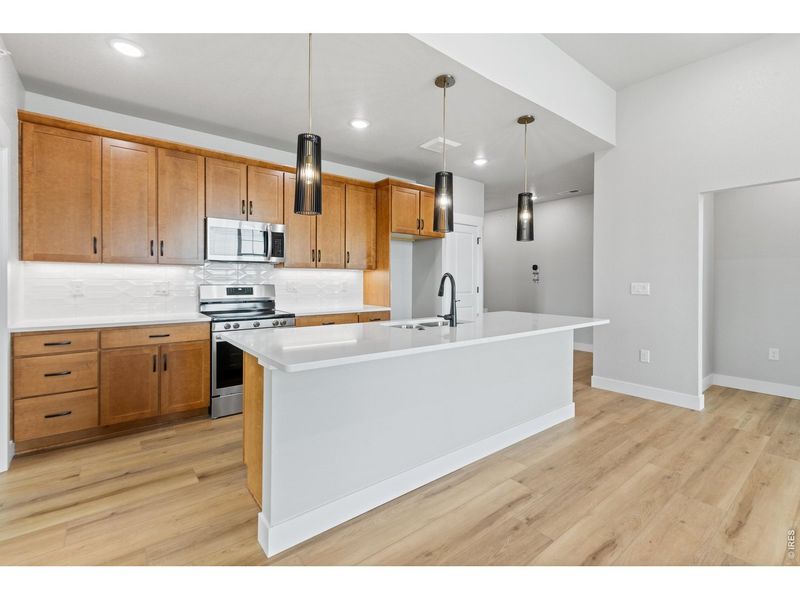 Furnished interior view inside a new home in Northfield at Old Town - Vista Collection, Fort Collins (Image 8).
