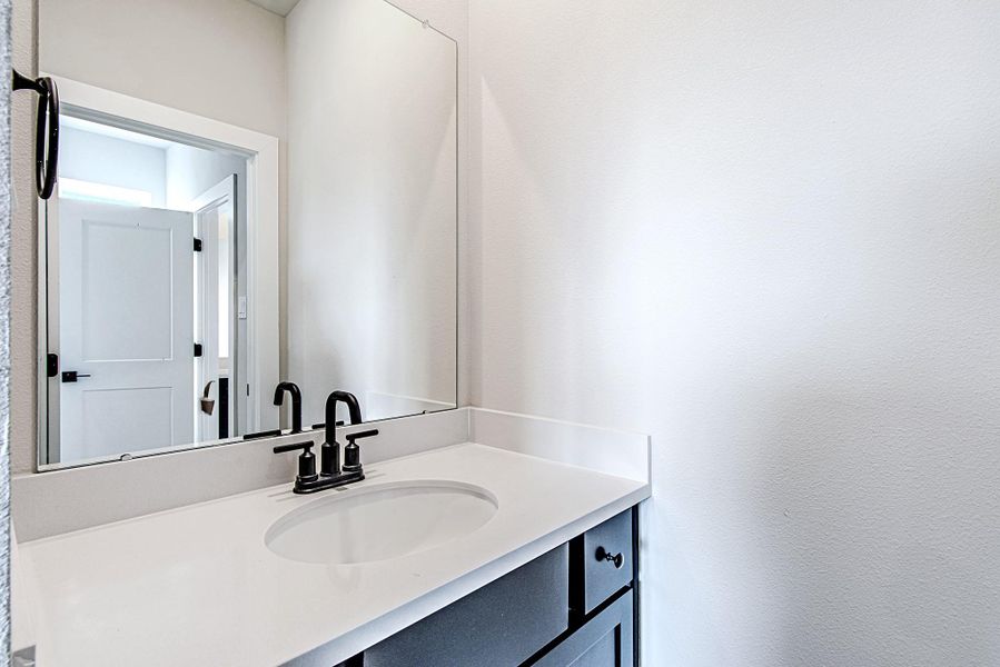 Additional view of the secondary bathroom featuring its vanity with ample counter space and storage Additional view of the secondary bathroom featuring its vanity with ample counter space and storage