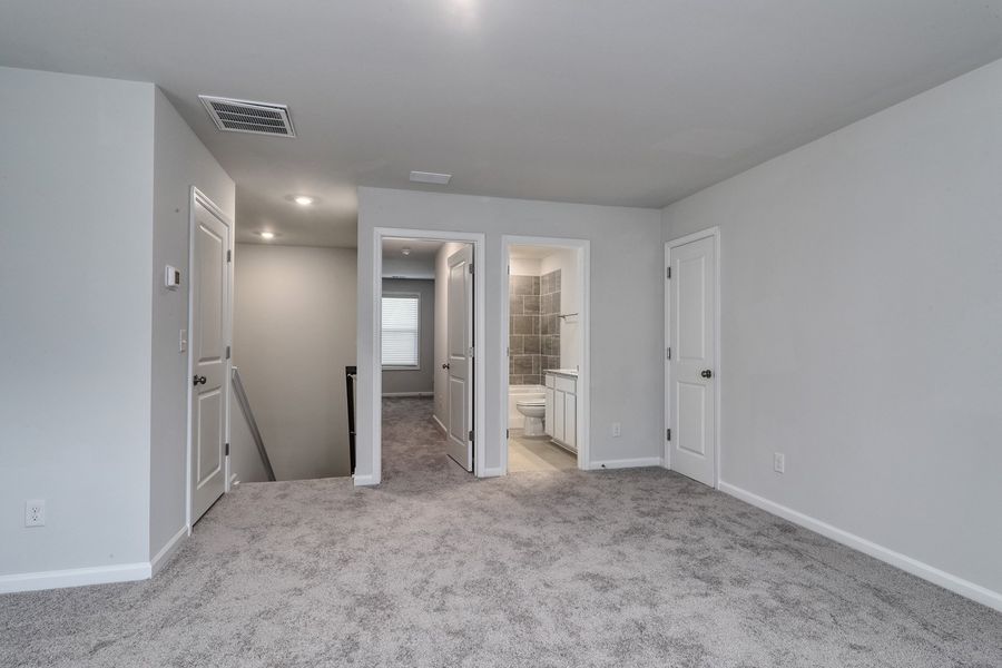 Spacious, unfurnished interior of a new home in Garden Grove, Conway (Image 27).