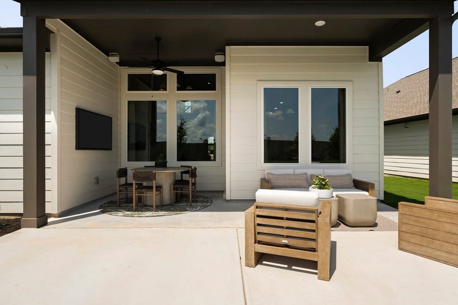 Exterior details and patio area of a home in Park Collection At Wolf Ranch, Georgetown (Image 3).