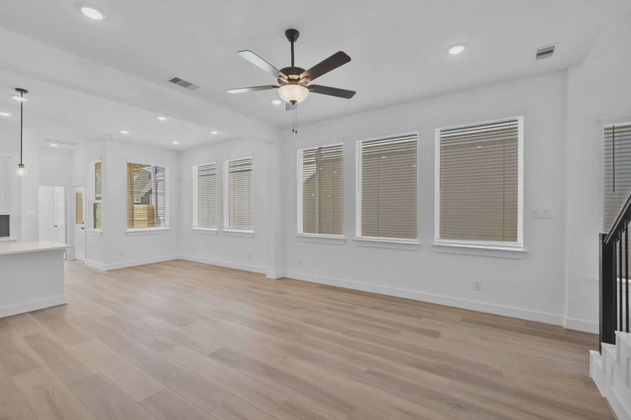 Representative unfurnished interior of a home built from the Versailles by Chesmar Homes in Meridiana Chateau, Manvel (Image 22).