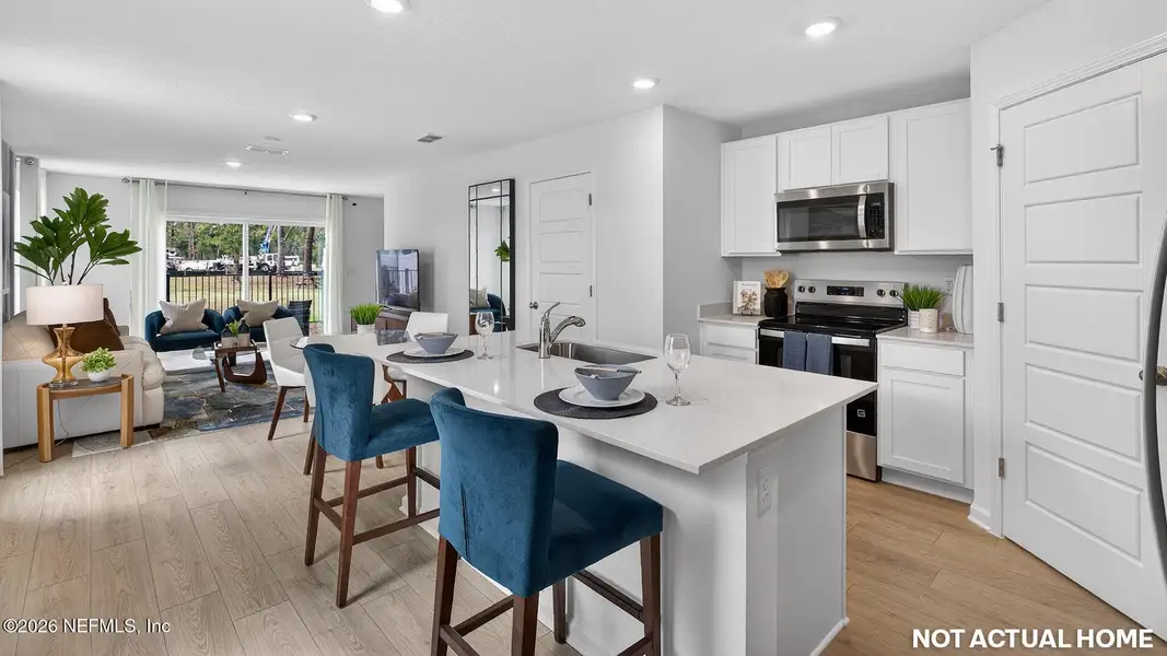 Furnished interior view inside a new home in Irongate Villas, Jacksonville (Image 7).