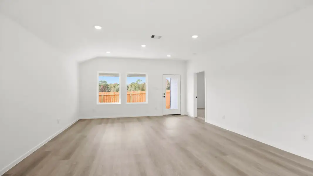 Spacious, unfurnished interior of a new home in The Canopies, Splendora (Image 8).