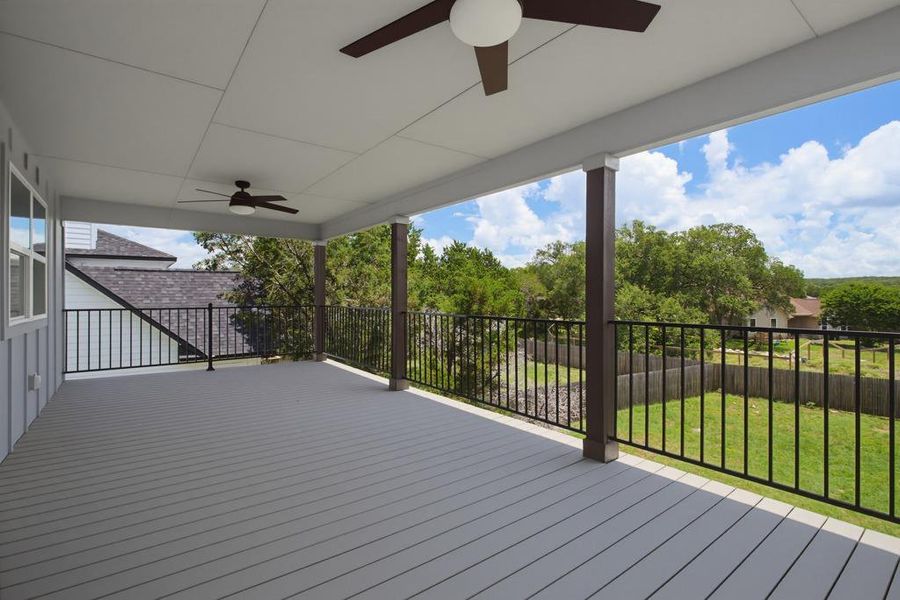 An inviting covered balcony with great views. An inviting covered balcony with great views.