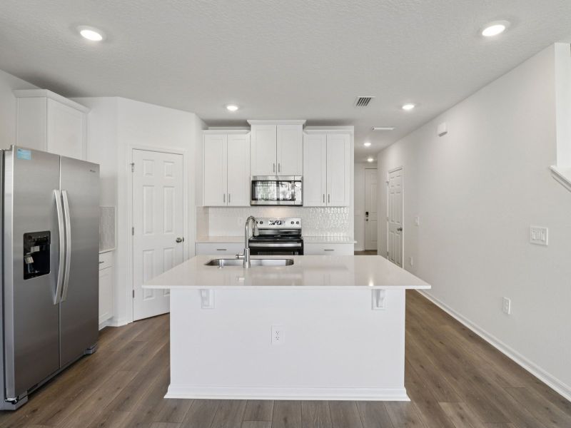 Furnished interior view inside a new home in Cagan Crossings West, Clermont (Image 3).
