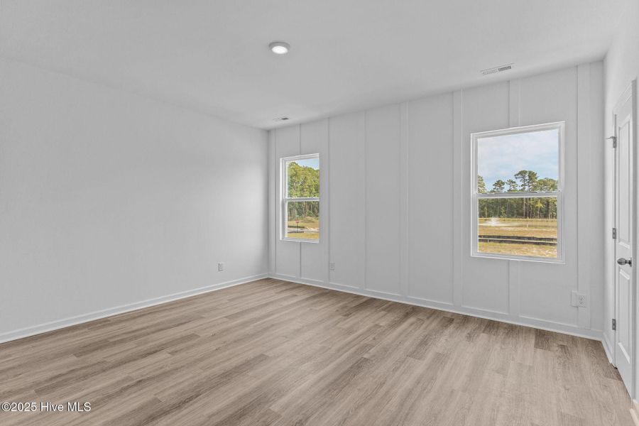 Spacious, unfurnished interior of a new home in Coastal Haven Townes, Leland (Image 25).