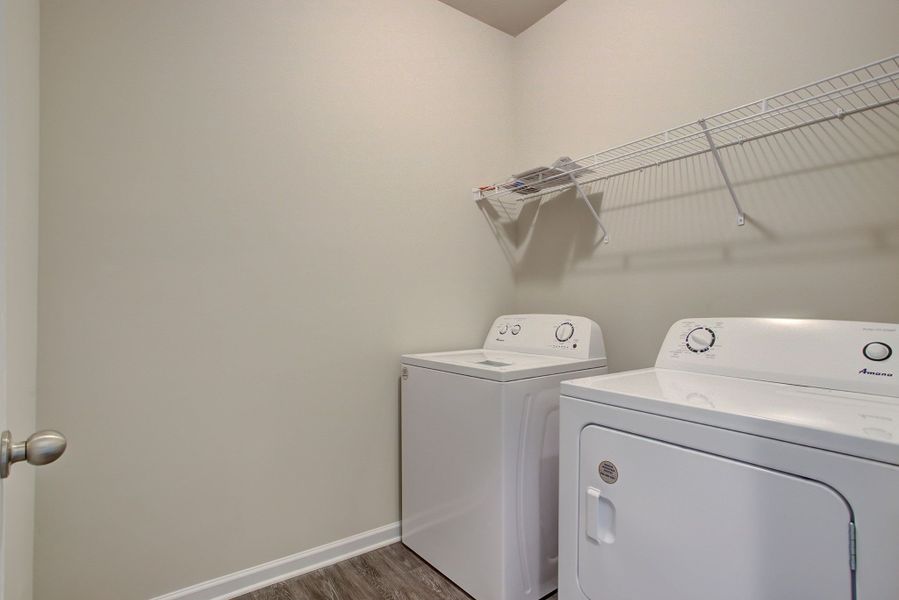 Easy accessible laundry room off of the primary bedroom