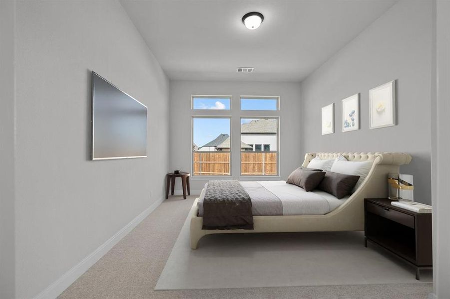 Neutral-toned room featuring a flush-mount ceiling light and carpeting Neutral-toned room featuring a flush-mount ceiling light and carpeting