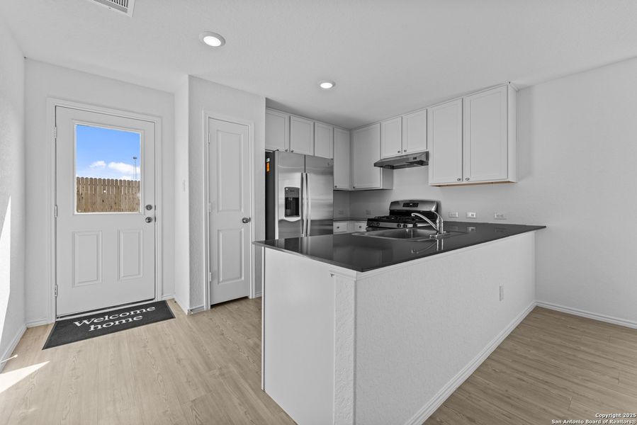 Furnished interior view inside a new home in , New Braunfels (Image 8).