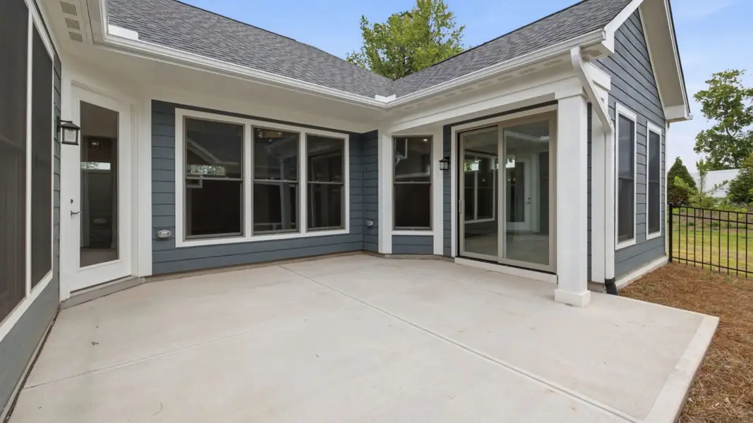 Exterior details and patio area of a home in The Courtyards at Oak Grove, Durham (Image 4).