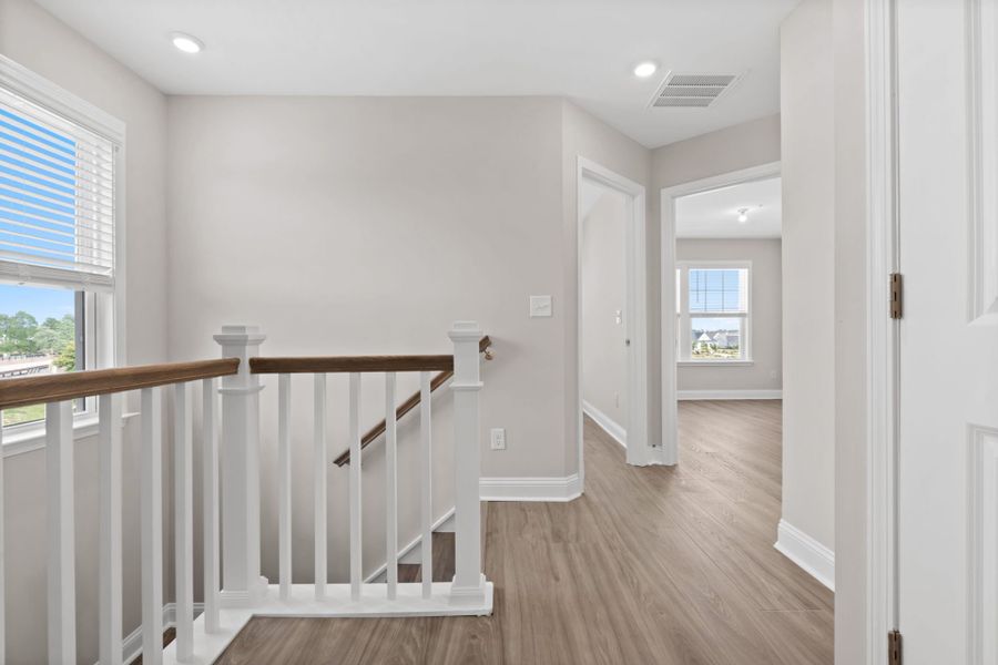 Spacious, unfurnished interior of a new home in Lakeside Townes at Riverlights, Wilmington (Image 23).