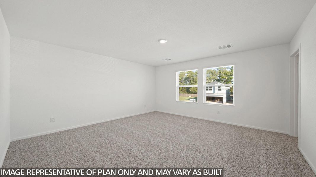 Spacious room featuring neutral carpet flooring, white walls, and two large windows providing natural illumination