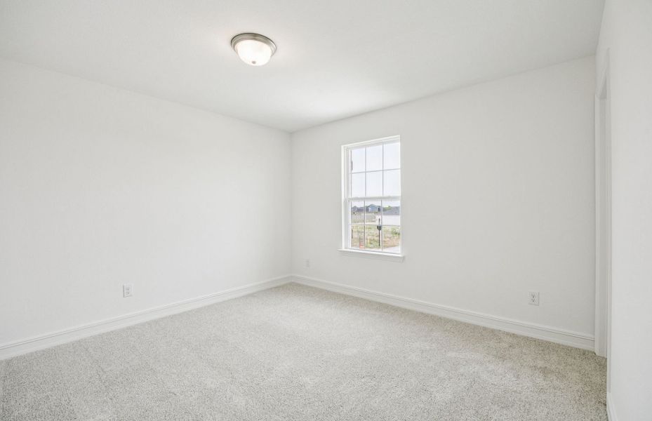 Secondary bedroom designed with generous storage solutions  *Real home pictured