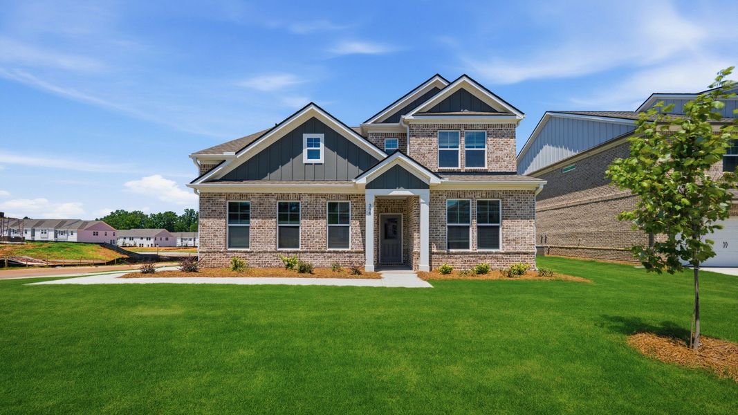 Representative exterior photo of a completed home built from the Wynwood by DRB Homes in Bowers Farm, McDonough, GA (Image 23).