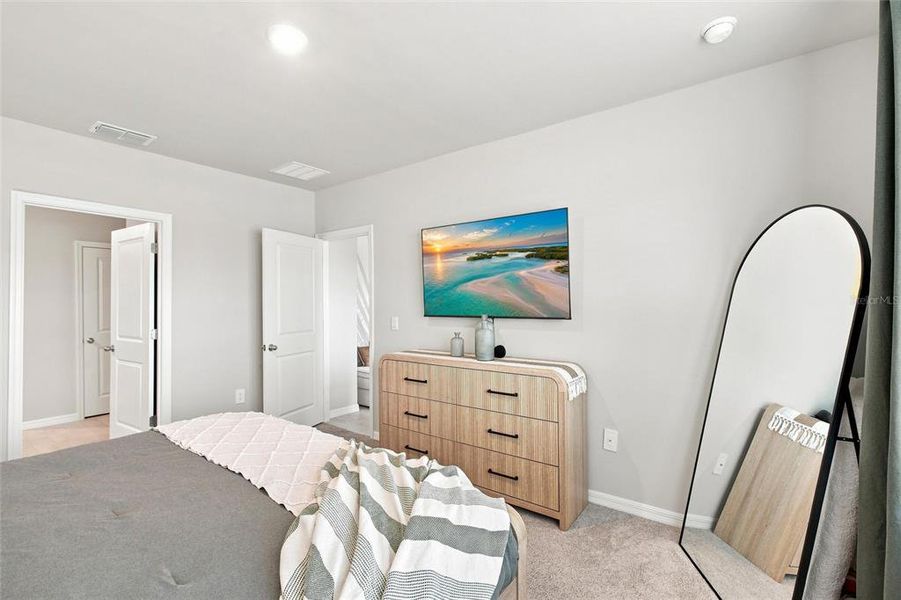 Furnished interior view inside a new home in Central Parc, North Port (Image 18). Furnished interior view inside a new home in Central Parc, North Port (Image 18).