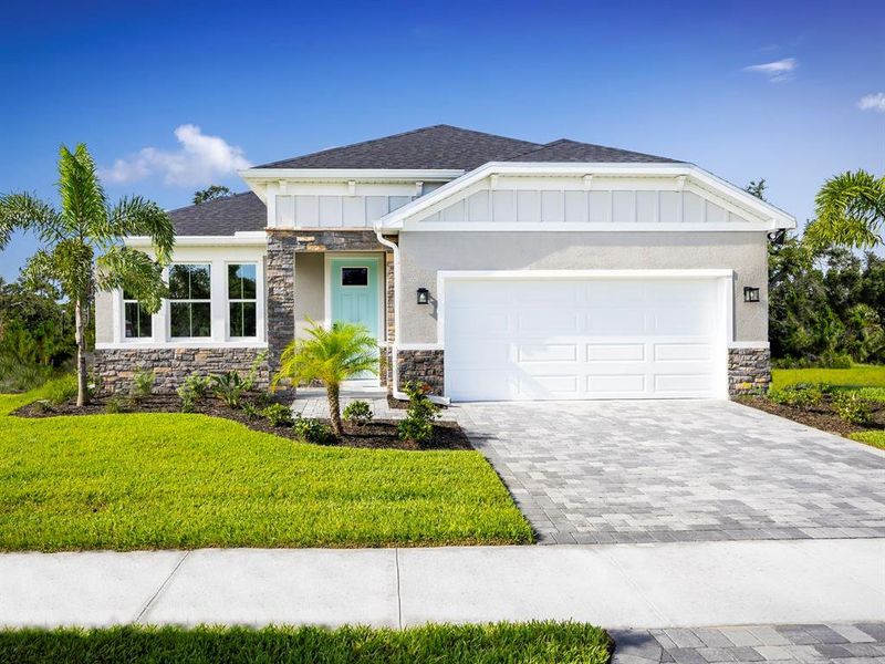 Front exterior of a new home in Malabar Springs, Palm Bay, FL, highlighting curb appeal (Image 1). Front exterior of a new home in Malabar Springs, Palm Bay, FL, highlighting curb appeal (Image 1).