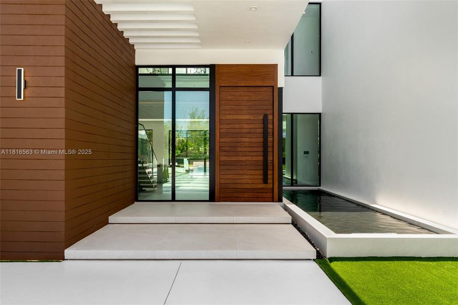 Exterior details and patio area of a home in , Miami (Image 3).