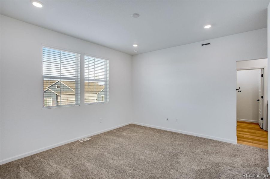 Spacious, unfurnished interior of a new home in Westside Crossing Townhomes, Berthoud (Image 32).