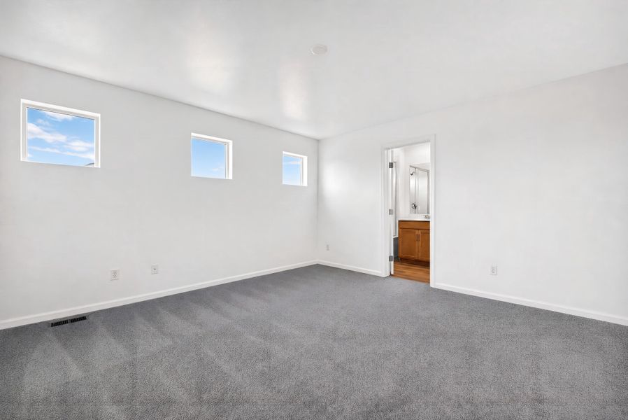 Spacious, unfurnished interior of a new home in Sky Ranch, Watkins (Image 17).