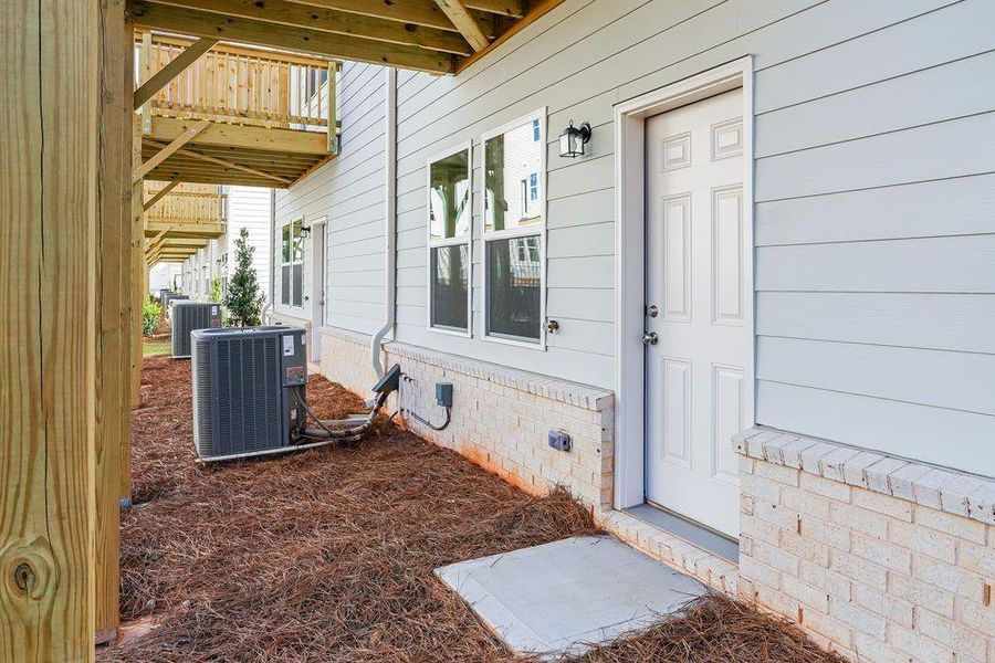 Exterior details and patio area of a home in Chandler Run, Tucker (Image 22). Exterior details and patio area of a home in Chandler Run, Tucker (Image 22).