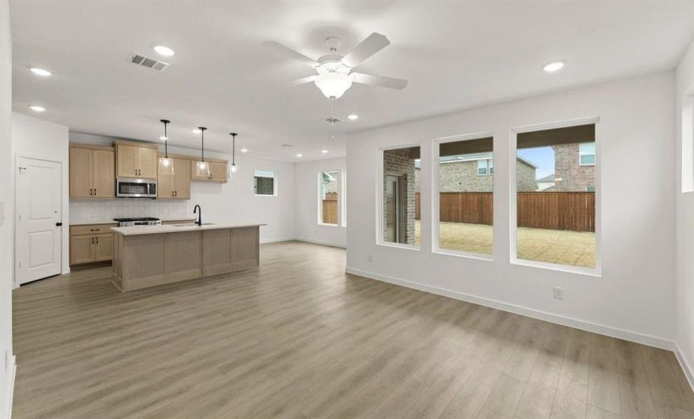 Open Kitchen-Living-Dining Room featuring the Artisan Collection