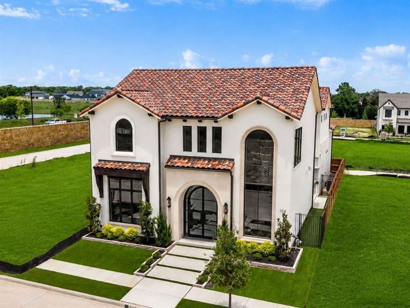 Front exterior of a new home in , Southlake, TX, highlighting curb appeal (Image 25).
