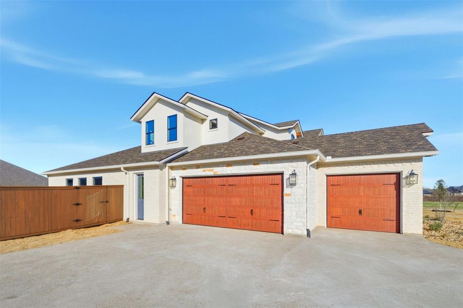 Front exterior of a new home in , College Station, TX, highlighting curb appeal (Image 29).