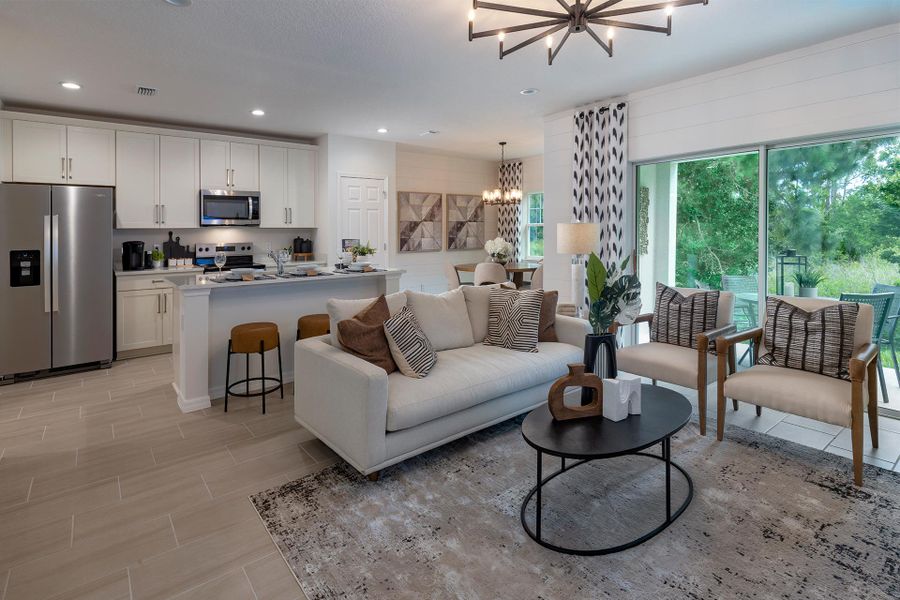 Furnished interior view inside a new home in Blue Springs Reserve Townhomes, Groveland (Image 4).